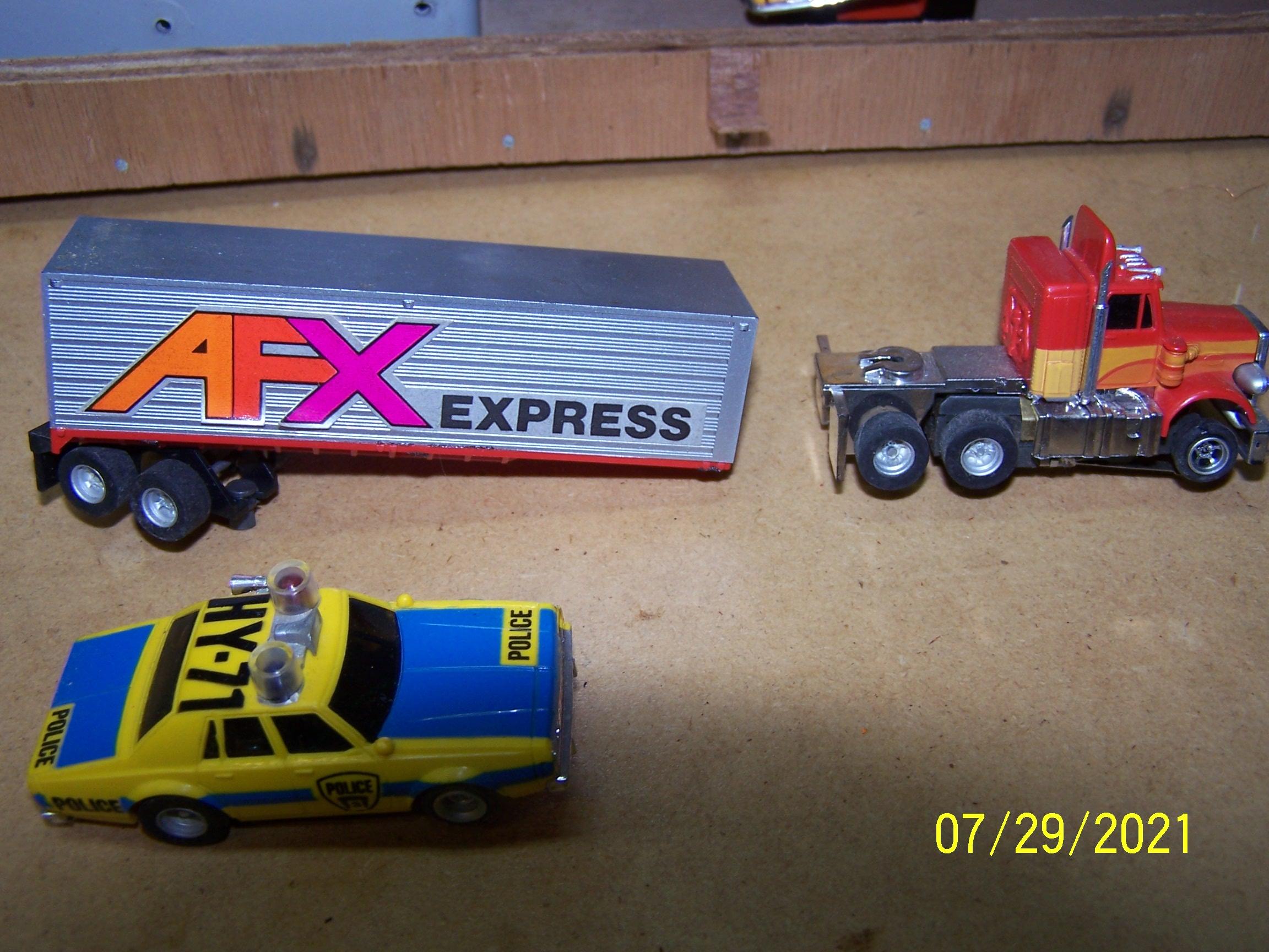 AFX TRUCK AND T-JET COP CAR